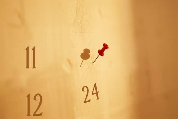 Calendar with a pin marking a date, representing tracking probate deadlines